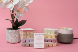 candle wax melts styled on pink background